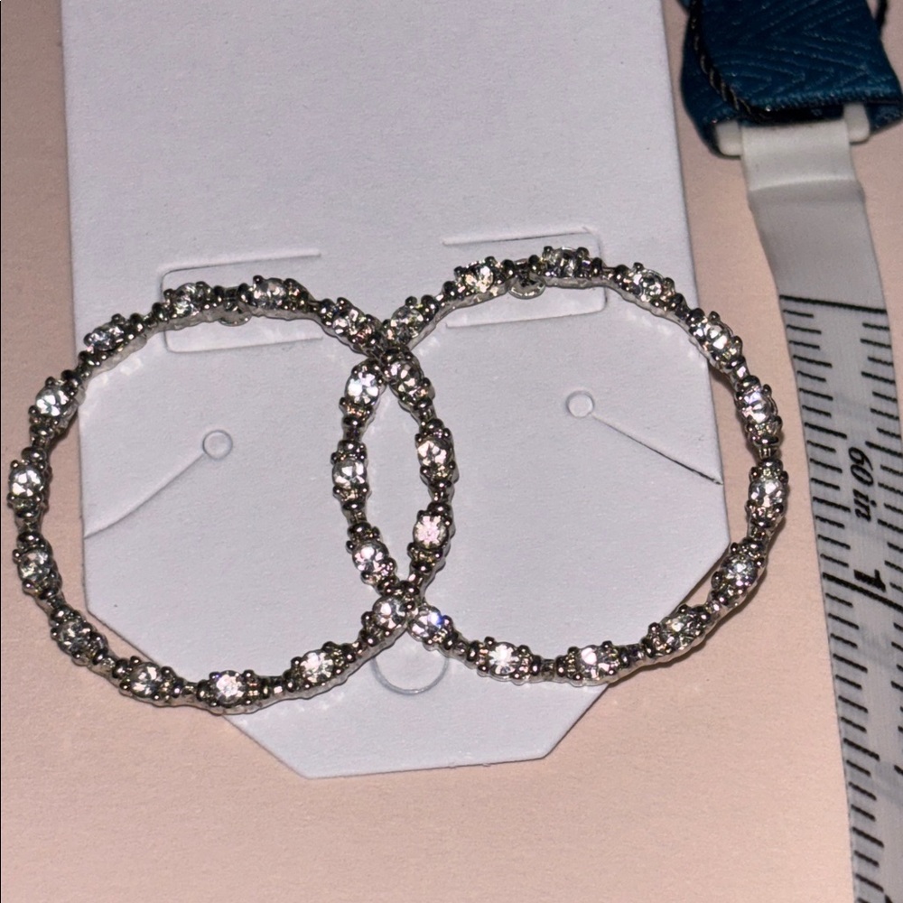 Silver-tone Wavy Hoop Earrings Adorned with Sparkling Stones